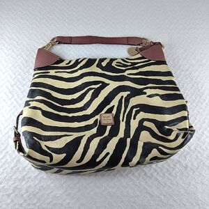 Dooney & Brooke vintage Black and Cream good condition. No rips. Large purse